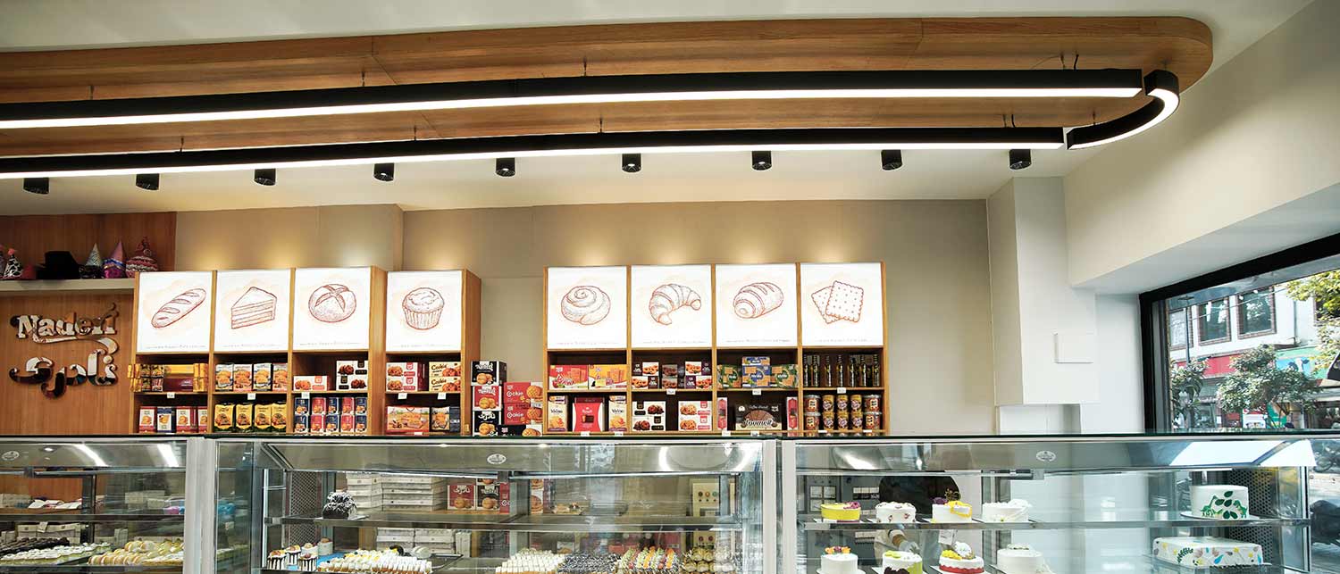 کلوچه-نادری-عکس-سایت-02 پروژه نورپردازی فروشگاه کلوچه نادری با محصولات اکووات